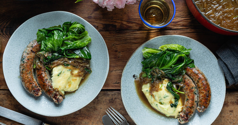 classic Cumberland sausage slowly cooked in a frying pan and the collection highlight for sausages & sausagemeat