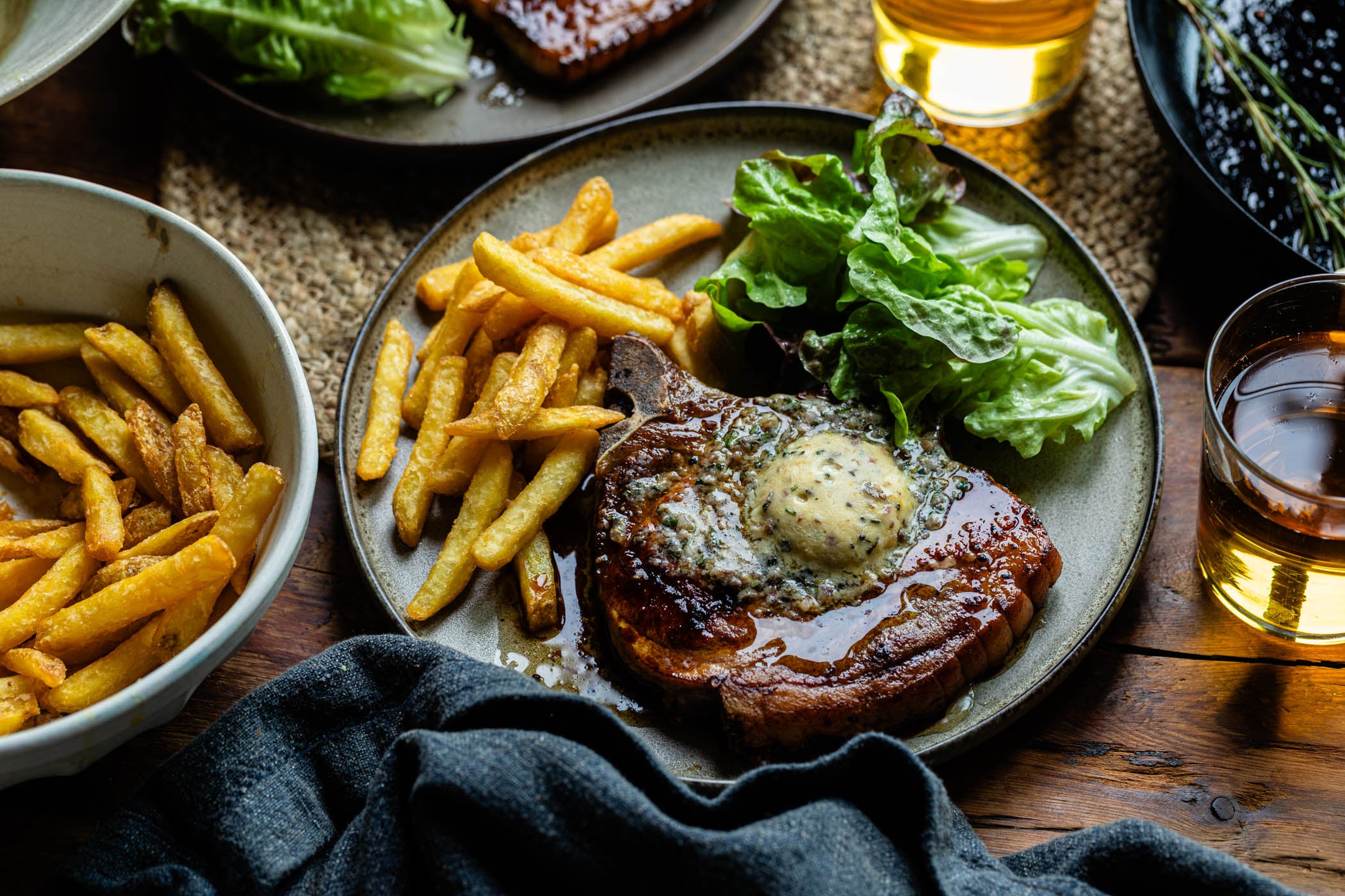 Pork Chop with Rosemary & Anchovy Butter