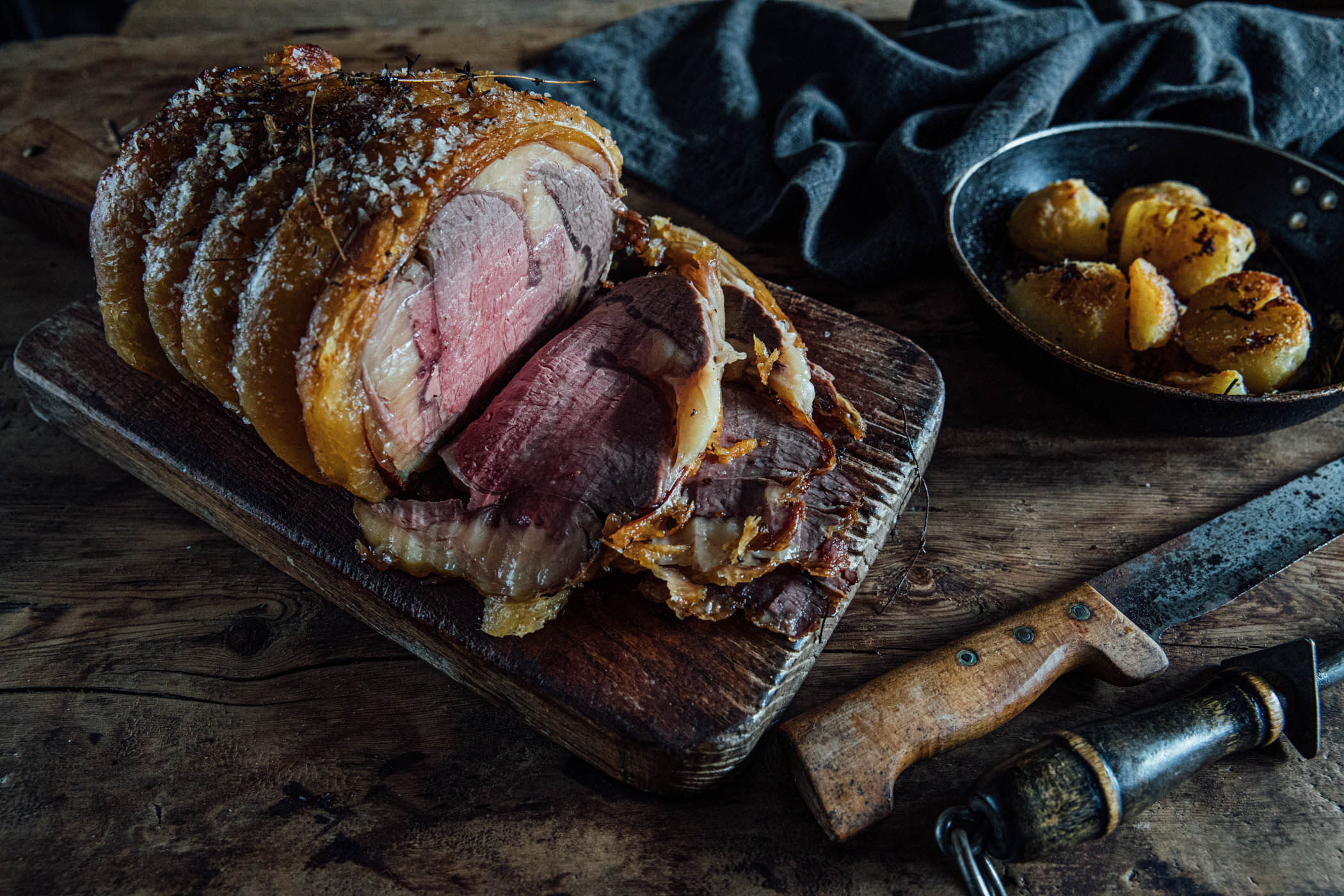 grass-fed, native breed, dry-aged sirloin roast perfectly cooked to medium rare and sliced ready to be served