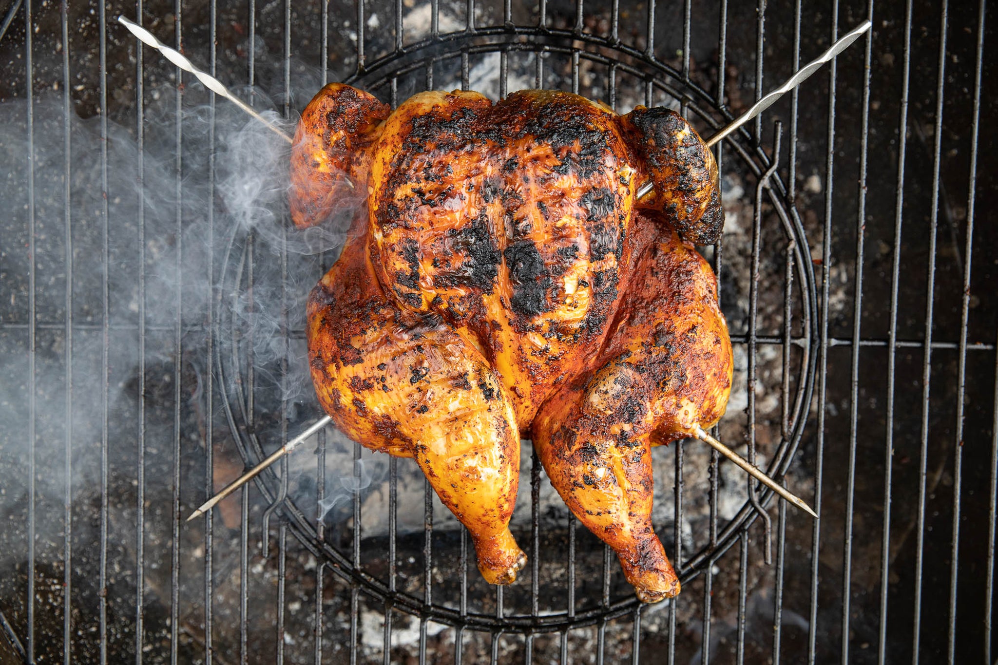 perfectly cooked free range, herb-fed spatchcock chicken on the bbq