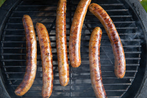 swaledale lamb merguez sausages almost cooked on the bbq and ready to be served