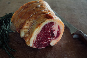 100% grass-fed, native breed, dry-aged sirloin rolled joint before roasting